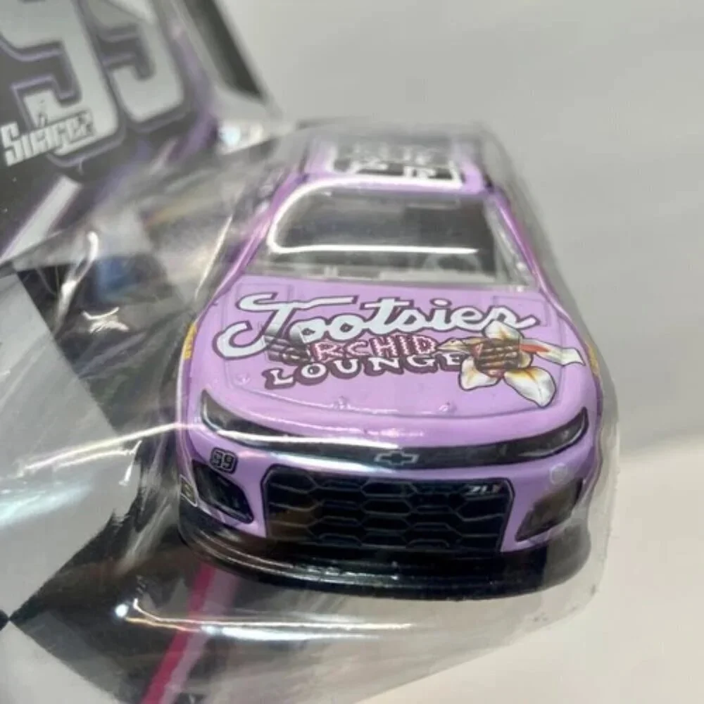 Nascar Authentics Tootsies Daniel Sua'rez 99 Wave 06 SKU-27661 Race Car NIP 2023